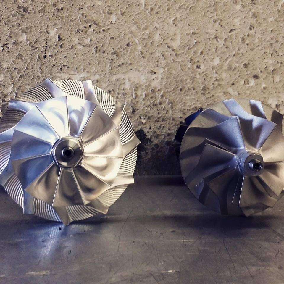 Two compressor wheel assemblies shown side by side