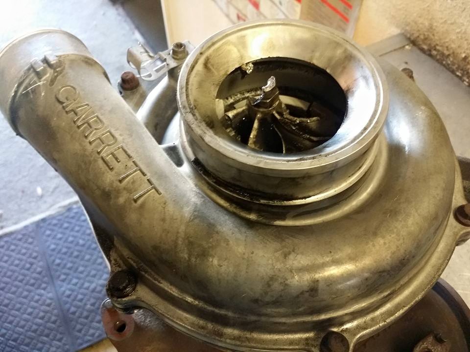 Compressor wheel showing visible blade damage