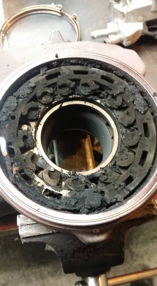 Turbocharger internal surfaces with heavy carbon buildup